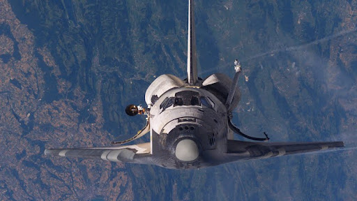 Shuttle Discovery on Approach to the International Space Station, STS-114.jpg