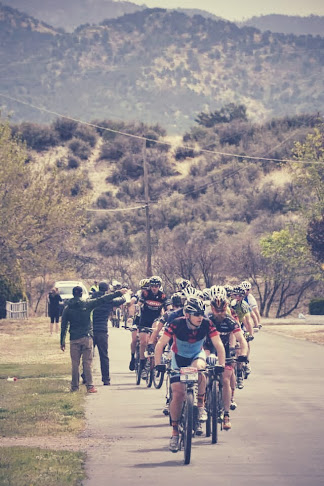 The feed zone was chaos. 40 people trying to grab bottles without slowing down. I went to the front to stay safe. 