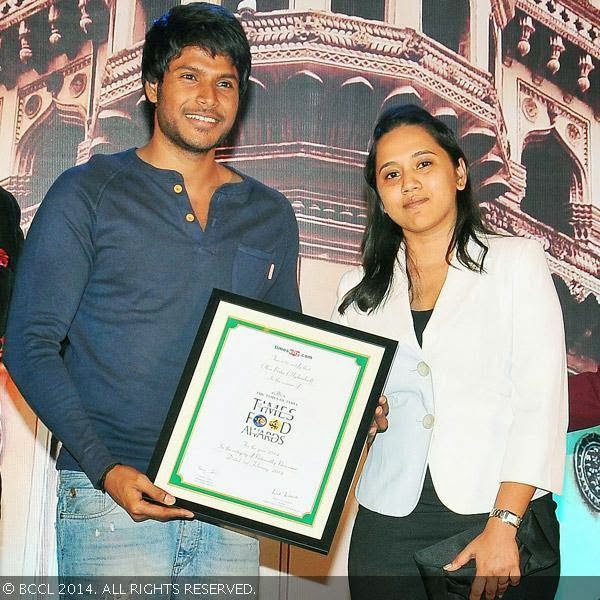 Sundeep Kishan presents (Noteworthy Newcomer) award to the team of Olive Bistro during the Times Food Guide & Nightlife awards 2014, held at HICC, Madhapur in Hyderabad.