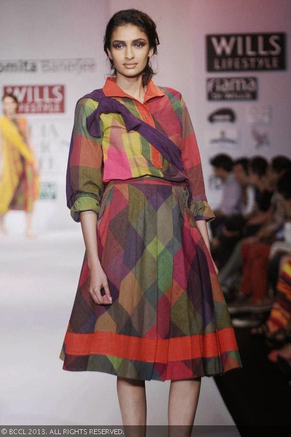 Archana walks the ramp for fashion designer Paromita Banerjee on Day 2 of the Wills Lifestyle India Fashion Week (WIFW) Spring/Summer 2014, held in Delhi.