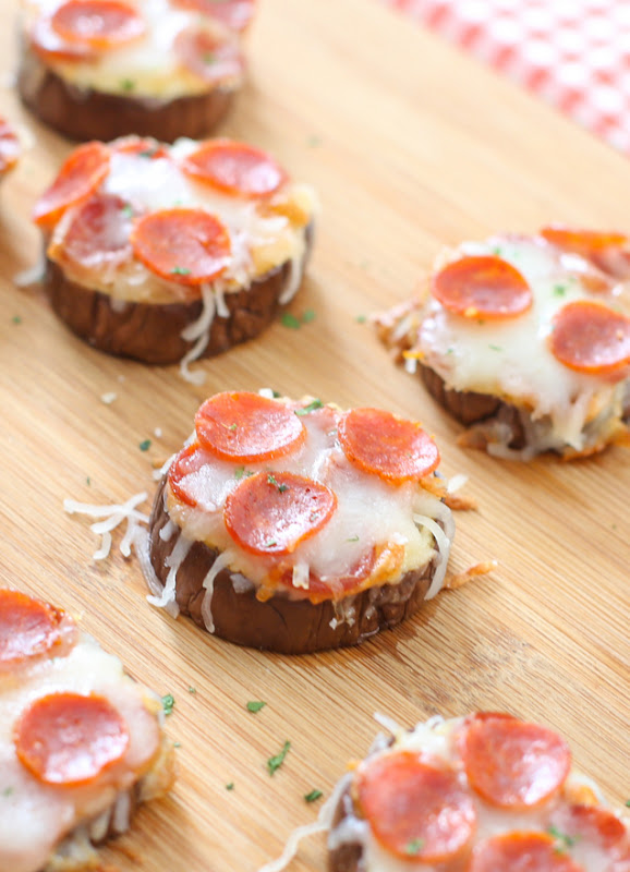 photo of mini eggplant pizzas on a cutting board