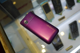 back side of mobile phone in China with an altered Oppo logo