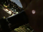 The light of the moon through the lens shines on my hand The light of the moon through the lens shines on my hand