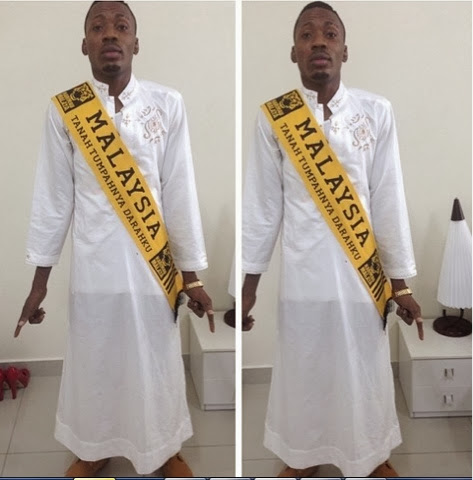 Lol See Krazy Fans Mimicking Olamide's Album Cover Pose 63 Lol See Krazy Fans Mimicking Olamide's Album Cover Pose 63