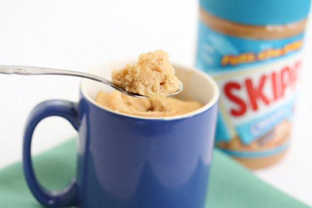 a close-up of a spoonful of lower-fat peanut butter mug cake