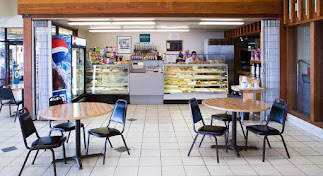  Gualala Pizza & Bakery, Gualala, California shows seating area and counter in the background