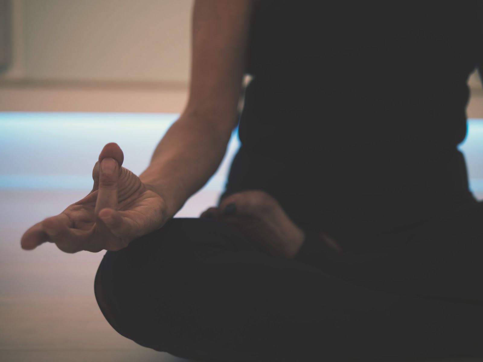 This image shows a person meditating