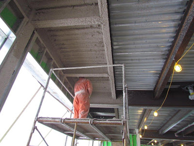 Spray fire retardant applied on ceiling of new addition Spray fire retardant applied on ceiling of new addition