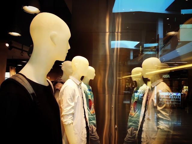 Manniquins face to face at Westfield Southcenter Mall, Tukwila WA.