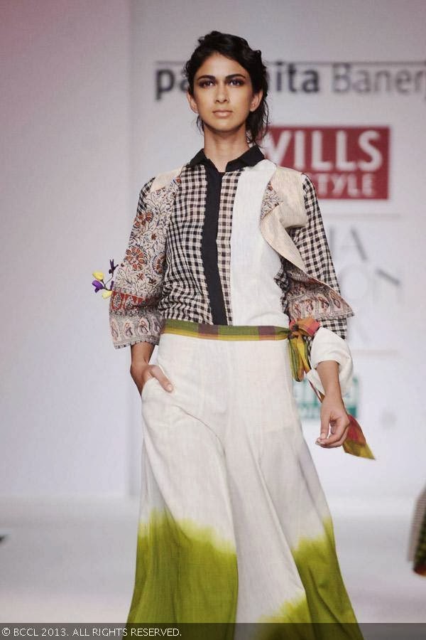 A model showcase a creation by fashion designer Paromita Banerjee on Day 2 of Wills Lifestyle India Fashion Week (WIFW) Spring/Summer 2014, held in Delhi.