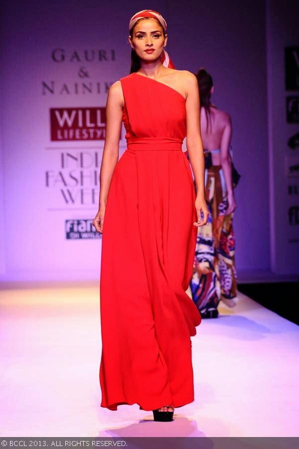 Aditi walks the ramp for fashion designers Gauri and Nainika on Day 1 of the Wills Lifestyle India Fashion Week (WIFW) Spring/Summer 2014, held in Delhi.