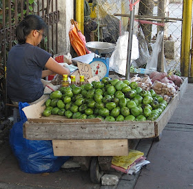 fruit vendor on the sidewalk