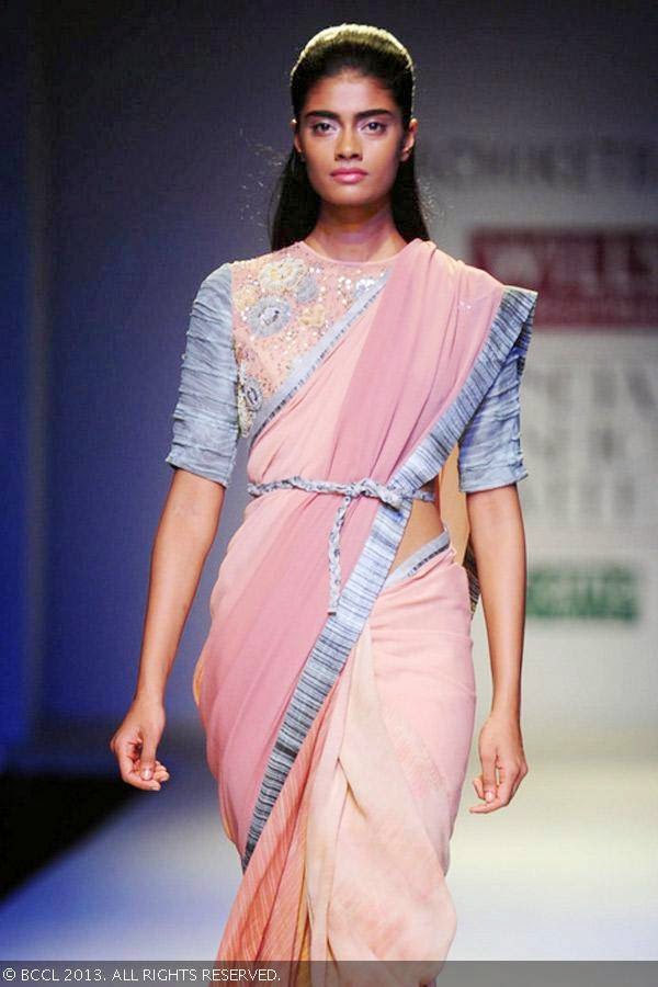 Archana walks the ramp for fashion designer Nachiket Barve on Day 1 of the Wills Lifestyle India Fashion Week (WIFW) Spring/Summer 2014, held in Delhi.