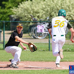 May 22, 2010; Merksem, Belgium. Belgian Baseball Championship (1BB) : match between the Merksem Greys and the Namur Angels (black). Namur Angels 1st base Thomas Vandenabeele (4) makes an out on a run by Greys #36. Greys defeated the Angels 3-1.
