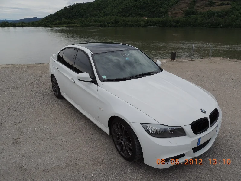 Voici ma titine avec un toit covering noir brillant - Bmw-serie3.com