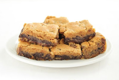 photo of Triple Threat Cookie Bars piled on a plate