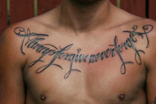 quoted chest tattoos