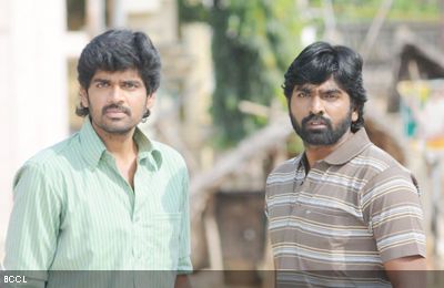 Inigo Prabakaran and Vijay Sethupathi in a still from the Tamil movie 'Rummy'.