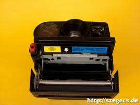 SX-70-es kazettát eszik