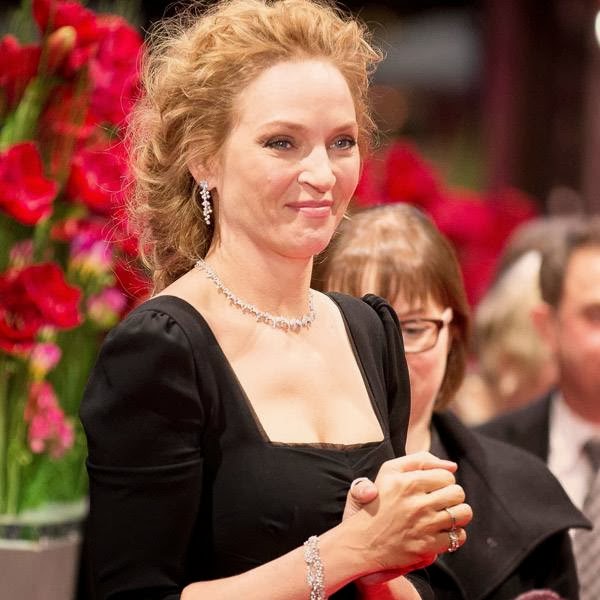 Actress Uma Thurman poses for photographers on the red carpet for the film Nymphomaniac at the International Film Festival Berlinale in Berlin, Sunday, Feb. 9, 2014. 