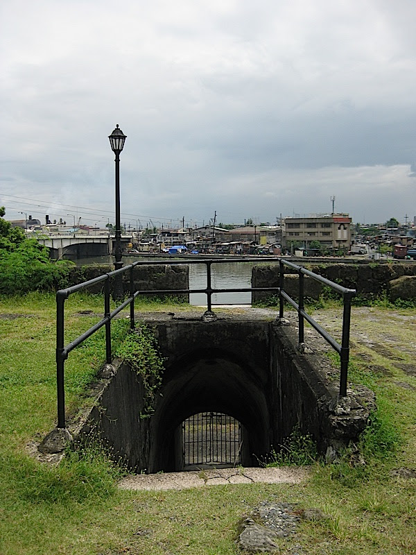 stairs through the wall of Fort Santiago to Pasig River
