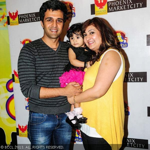Sachin Shroff and Juhi Parmar with their daughter during pre-christmas party, held at Amoeba, in Mumbai, on December 18, 2013.