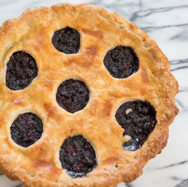 overhead photo of baked blueberry pie