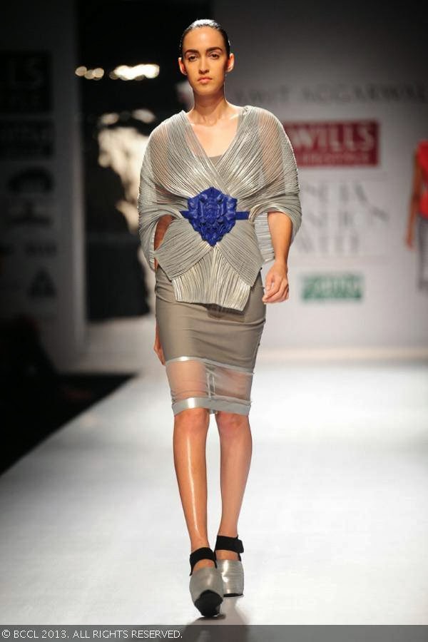 Tamara Moss walks the ramp for fashion designer Amit Aggarwal on Day 2 of the Wills Lifestyle India Fashion Week (WIFW) Spring/Summer 2014, held in Delhi.