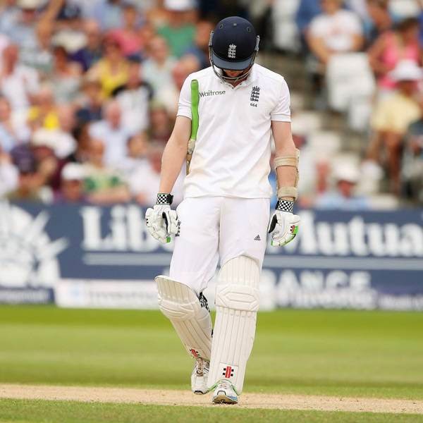  England's Sam Robson leaves the pitch after being dismissed for 59 runs during the third days play in the first cricket Test match between England and India at Trent Bridge in Nottingham, central England on July 11, 2014.