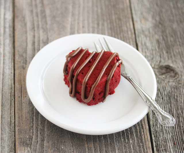 photo of a Red Velvet Nutella Cake on a plate with a fork