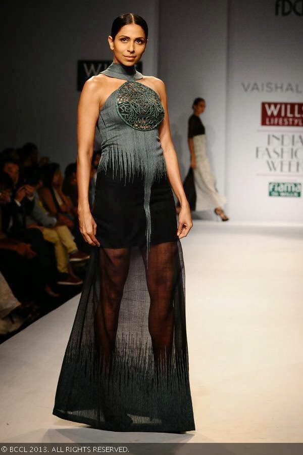 Candice Pinto walks the ramp for fashion designer Vaishali S on Day 5 of Wills Lifestyle India Fashion Week (WIFW) Spring/Summer 2014, held in Delhi.