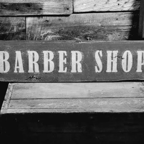 Old West Barber Shop logo