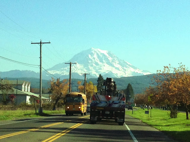 School bus in Orting, Washington with Mt Rainier in the background.