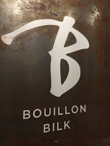 Sign of Bouillon Bilk, snuggled between two electronic shops in Montreal