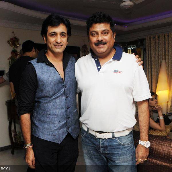 Rajeev Paul and Kapil Mehra pose for the camera during Sana Khan's 26th birthday celebrations in Mumbai on August 21, 2013. (Pic: Viral Bhayani)