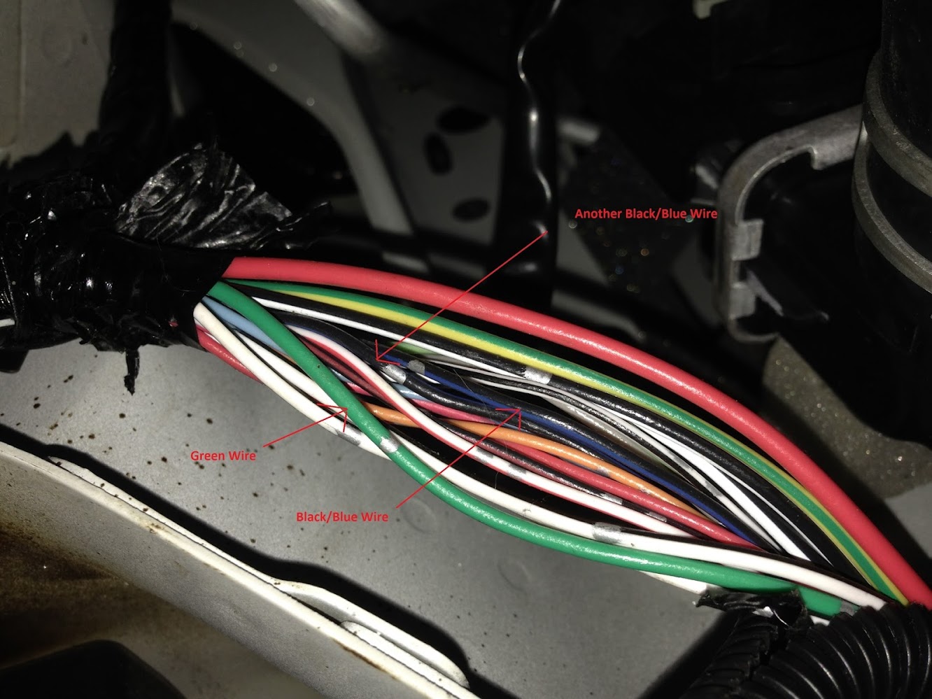 8) Install one vampire clip on the Green wire and add a new wire (I used red). Then install another vampire clip on the Black/Blue wire and insert the same ...