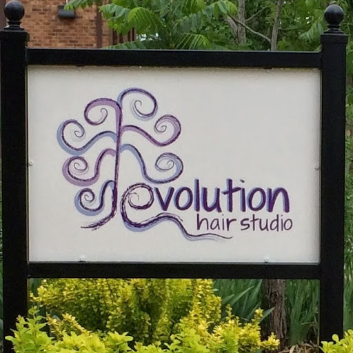 Evolution Hair Studio logo
