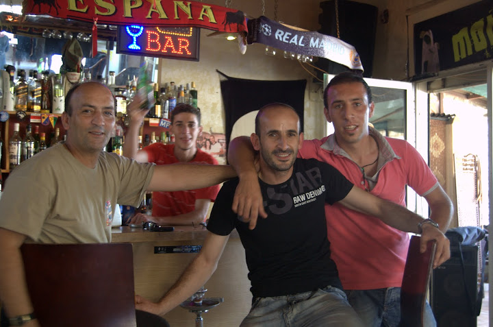 Fayez (middle, in black), Mirage owner and his friends