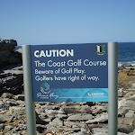 Caution sign about golf near Little Bay (18018)