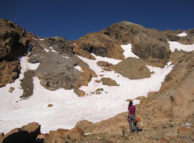 Sara figuring out the best way up to the route while she waits for me to catch up