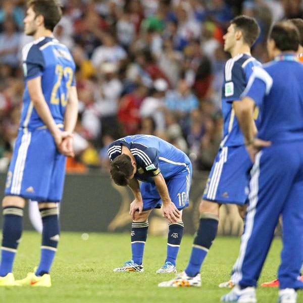 Argentina's forward and captain Lionel Messi (C10#) reacts after defeat in the final football match between Germany and Argentina for the FIFA World Cup at The Maracana Stadium in Rio de Janeiro on July 13, 2014. 