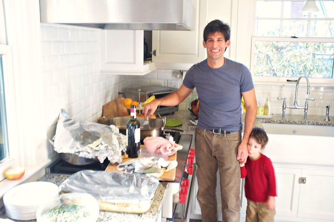 Father and (sleepy) son preparing an Italian Thanksgiving dinner.