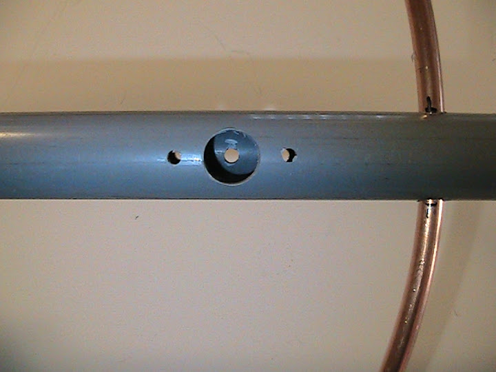 The PVC
                      Boom is drilled for the SO-239 antenna connector.
                      The center pin is 1-7/8" away from the center
                      point of the copper tubing.