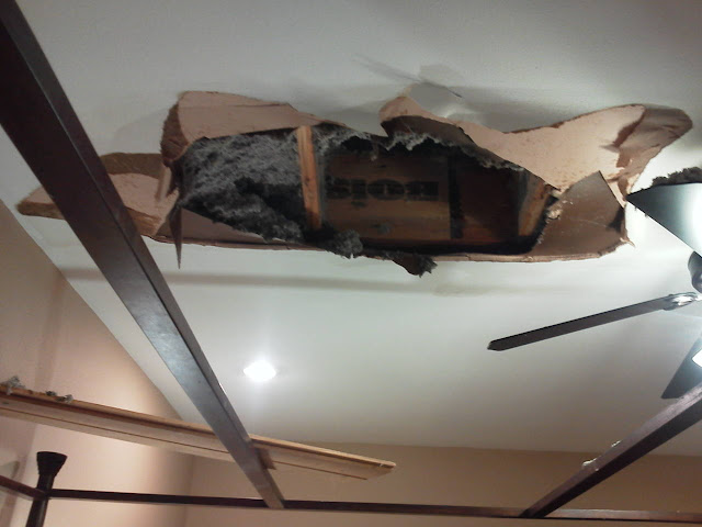 Leak in ceiling under bathroom
