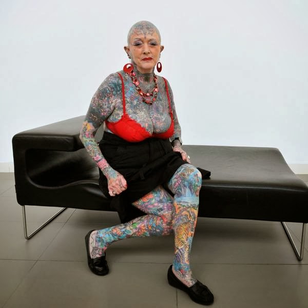 Septuagenarian Isobel Varley poses during 'II Expotatoo' tattoo fair in Gijon, northern Spain, May 15, 2009. Varley, who was born in 1937, is the most senior tattooed woman in the world according to the Guinness World Records. 