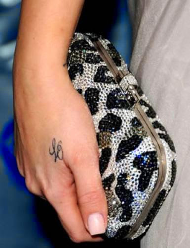 Khloe Kardashian Explains Why She Hasnt Removed Her Lamar Odom Hand Tattoo