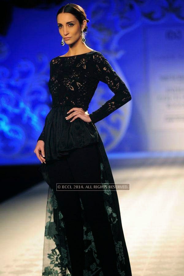 Marcela walks the ramp for Varun Bahl walks the ramp on Day 3 of India Couture Week, 2014, held at Taj Palace hotel, New Delhi.<br /> 