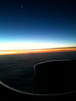 a view of the horizon from an airplane window