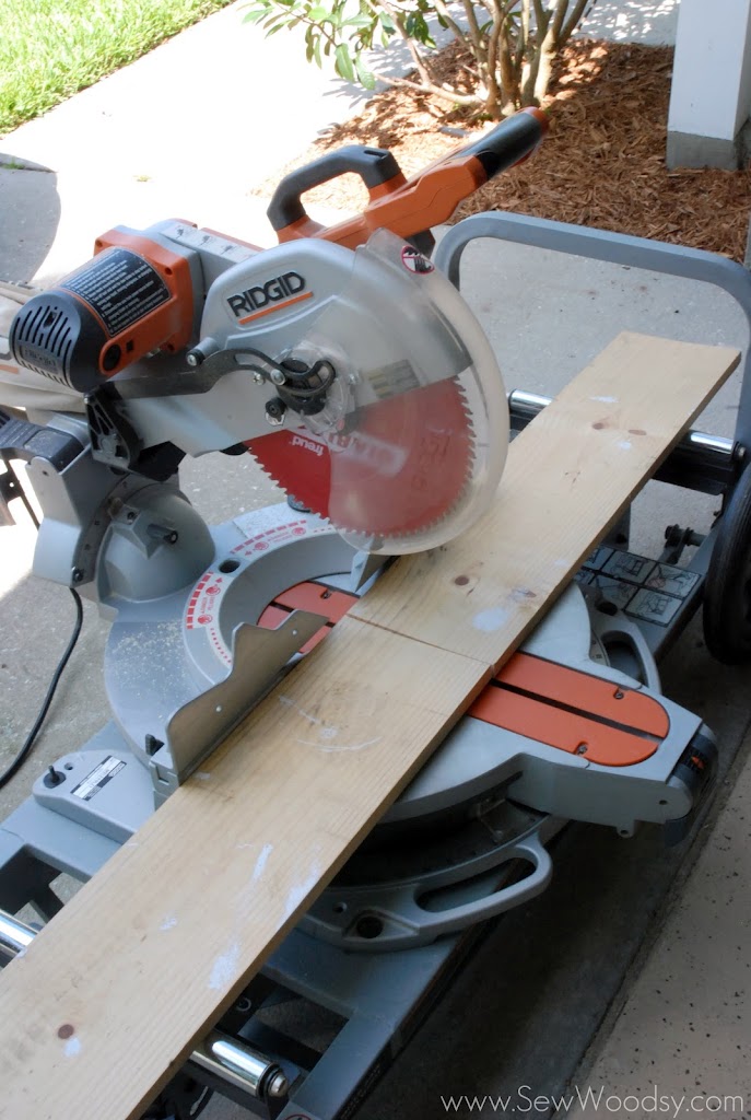 Ridgid miter saw with a cut 2x10 board.