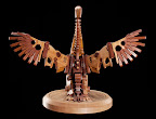 swan mechanical sculpture wood